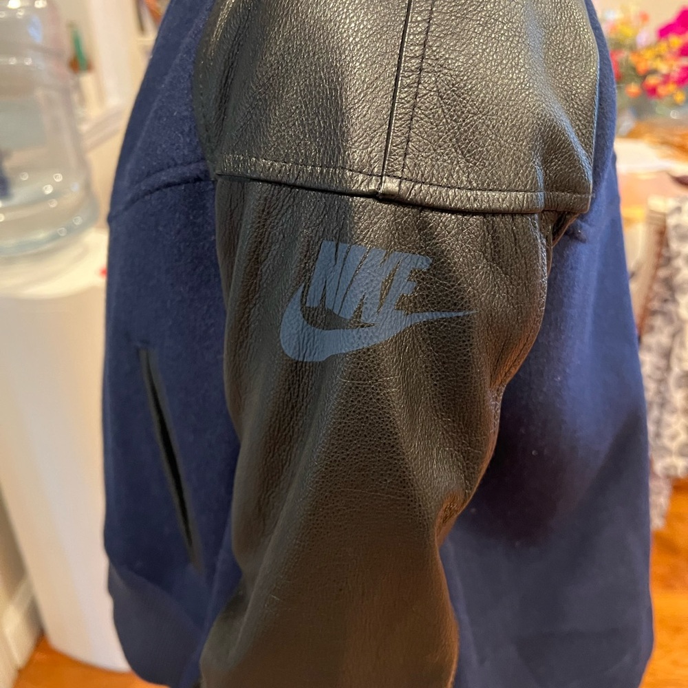 Nike X Sacai Black and Blue wool/leather jacket cape
Unisex